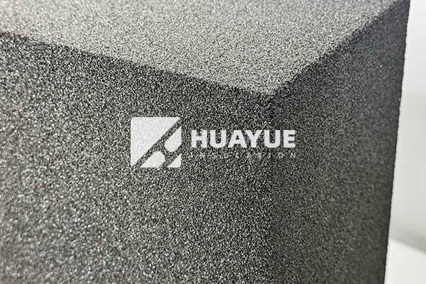 close-up of insulation roof board cellular glass showing closed-cell structure, lab sample
