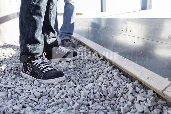 Foam glass gravel installed as lightweight subslab insulation